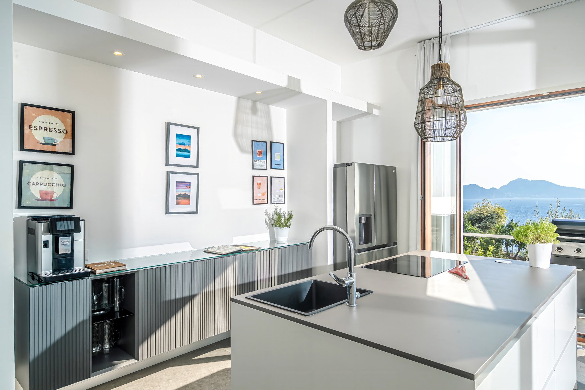 The contemporary kitchen with its large working island